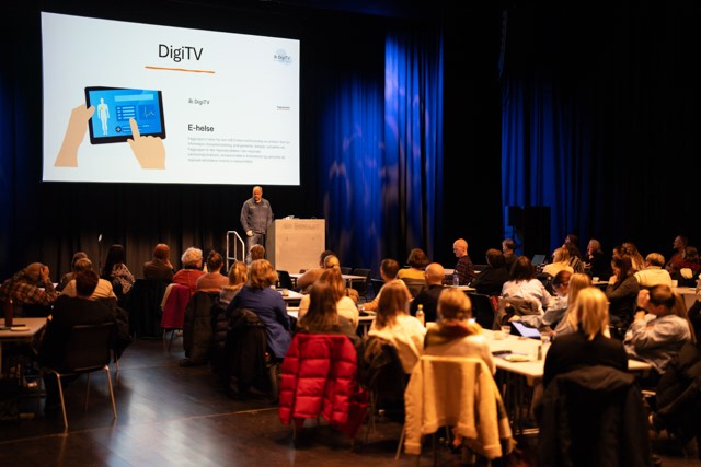 En person som presenterer på en konferanse